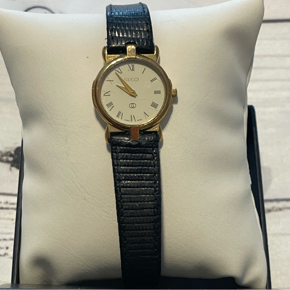 GUCCI vintage women’s watch. Original Black strap. Preowned main image 1